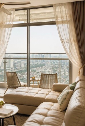 ซูพีเรียอพาร์ทเมนท์, 3 ห้องนอน, ห้องครัว, วิวเมือง | บริเวณนั่งเล่น | ทีวี 35 นิ้ว พร้อมช่องเคเบิล