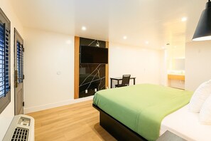Habitación individual Deluxe, 1 cama King size | Escritorio, espacio para trabajar con laptop y wifi gratis