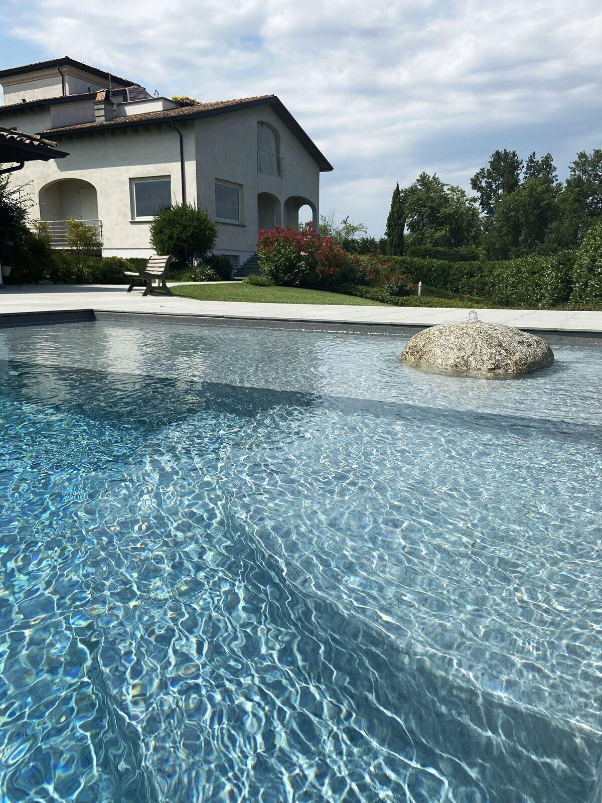 Seasonal outdoor pool, pool loungers