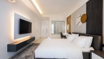 Minibar, desk, laptop workspace, blackout curtains
