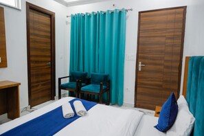 Deluxe Double Room, City View | Soundproofing, free WiFi, bed sheets - Goroomgo Parth Inn Rishikesh (Narendranagar)