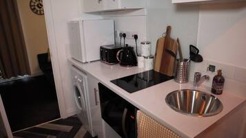 Apartment | Private kitchen | Fridge, microwave, stovetop, electric kettle