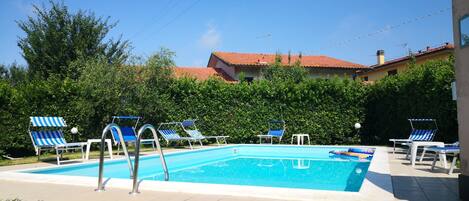 Alberca al aire libre por temporada