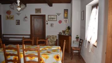 Apartment, Hill View | Living area | 32-inch flat-screen TV with cable channels