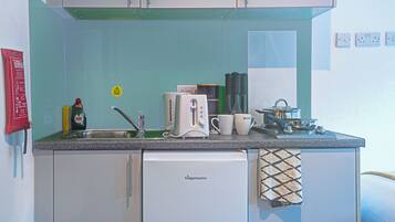 Deluxe Studio, 1 Double Bed | Private kitchen | Fridge, stovetop, coffee/tea maker, electric kettle