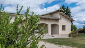 A building with a traditional architectural style, featuring a pitched roof and a symmetrical facade. - Villa D'Angelo (Casalbordino)