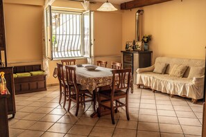 Apartment, 2 Bedrooms, Ground Floor | Living area | Flat-screen TV