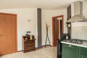Apartment, 1 Bedroom, Balcony | Private kitchen | Fridge, oven, coffee/tea maker, electric kettle - Appartamento Edolo, Bilocale & Monolocale (Edolo)
