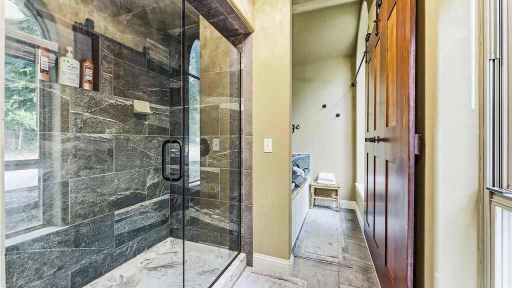 Shower, hair dryer, towels, shampoo