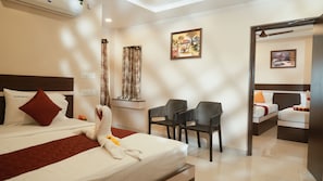 Superior Quadruple Room, Mountain View | In-room safe, desk, laptop workspace, blackout drapes