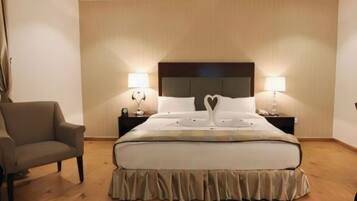 Coffres-forts dans les chambres, fer et planche à repasser