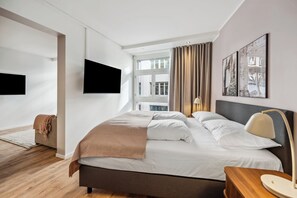Suite Comfort, 1 Tempat Tidur Queen dengan tempat tidur Sofa | Didekorasi berbeda-beda dan dilengkapi dengan perabotan berbeda-beda