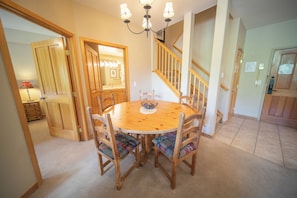 Enjoy meals in this inviting dining area with a round table and six comfortable chairs.