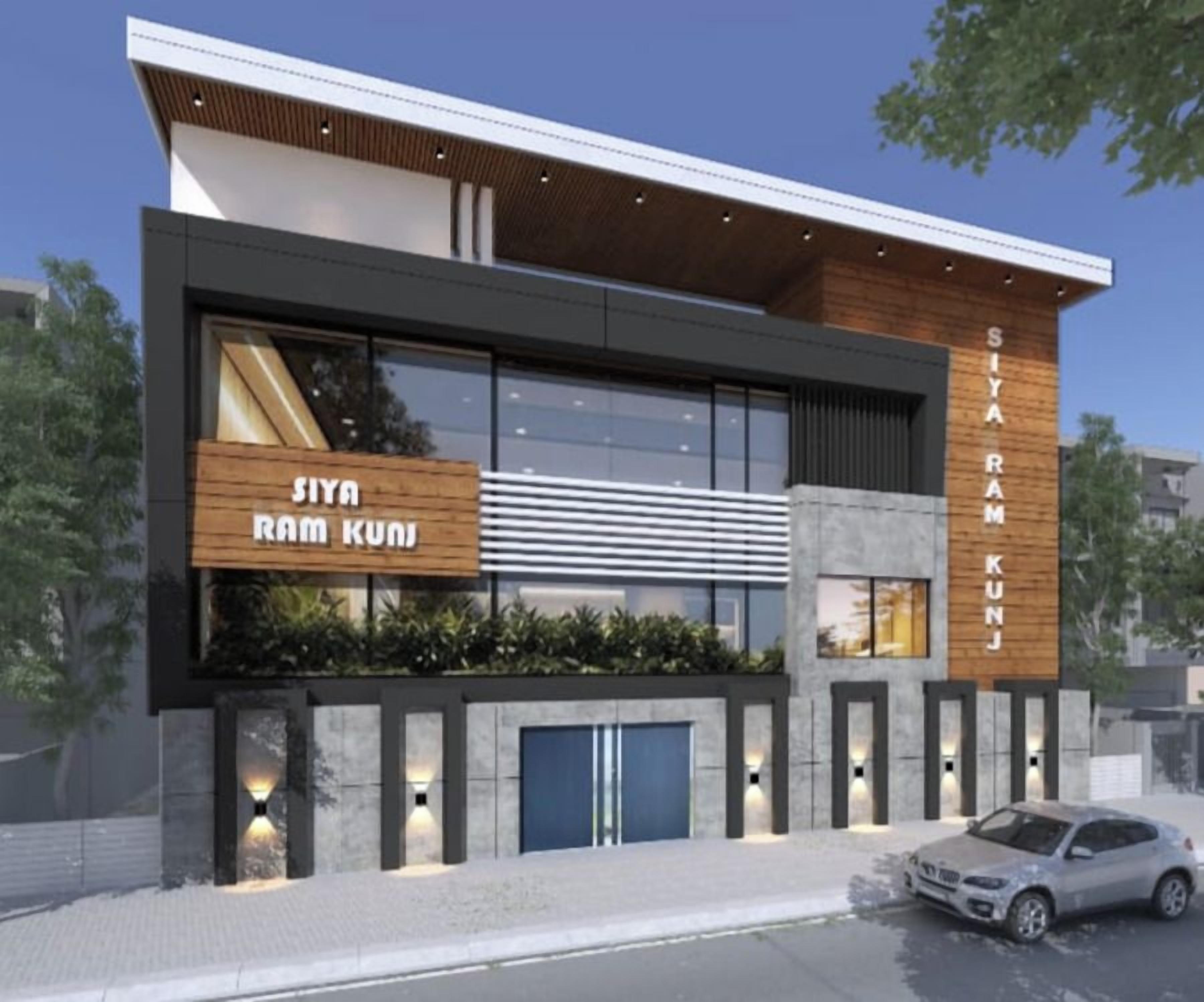 A modern building with a large glass facade, a wooden signboard, and a car parked in front.