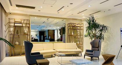 1BR condo 57sqm with Balcony free wifi Abreeza place towers