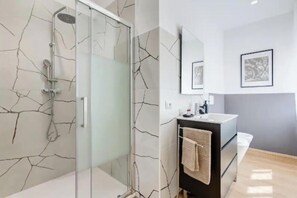 Hair dryer, bidet, towels, soap