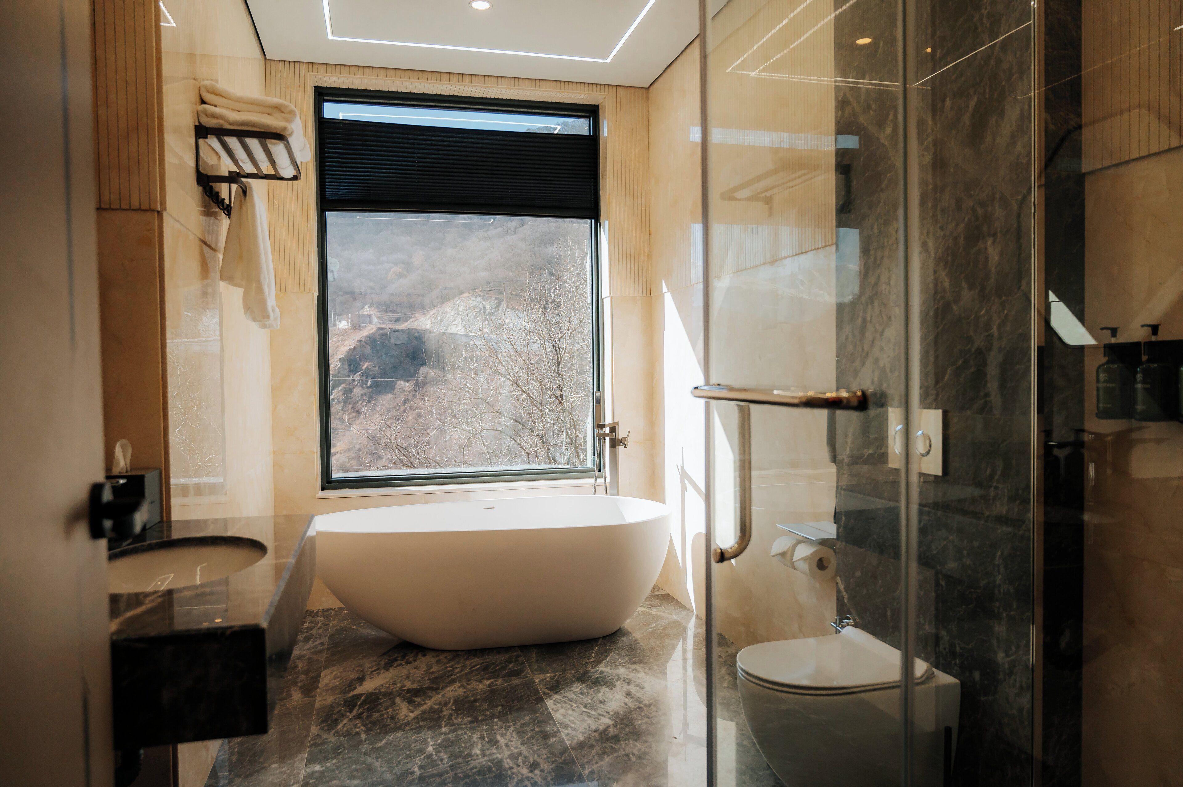 Luxury Chalet, Lanai, Mountain View | Bathroom | Hair dryer, slippers, towels, soap