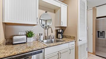 Condo, 1 Bedroom | Private kitchen | Dishwasher, cookware/dishes/utensils