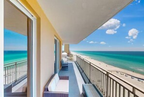 A balcony with a view of a beach and ocean. - Splash 507e (Panama City Beach)