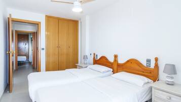 Apartment, 2 Bedrooms, Balcony, Beach View | Iron/ironing board, travel crib, free WiFi, bed sheets