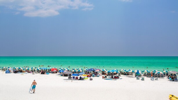 A beach with numerous umbrellas and beach chairs, a sandy shore, and a clear blue sky. - Sea La Vie - 30A! Summers Edge in Seagrove Beach, Heated Community Pool! (Seagrove Beach)