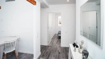 Family Apartment, 3 Bedrooms, Balcony, City View | Living area | Flat-screen TV