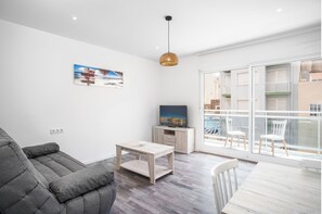 Apartment, 3 Bedrooms, Balcony, City View | Living area | Flat-screen TV