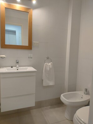 Hair dryer, towels, soap, toilet paper