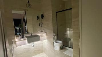 Family Suite, Multiple Bedrooms, Lanai | Bathroom | Shower, hair dryer, towels, soap