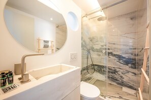 Shower, hair dryer, towels, soap