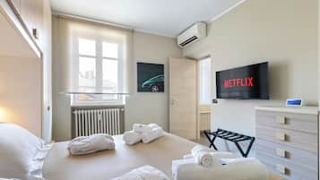 1 habitación, tabla de planchar con plancha, wifi gratis y ropa de cama