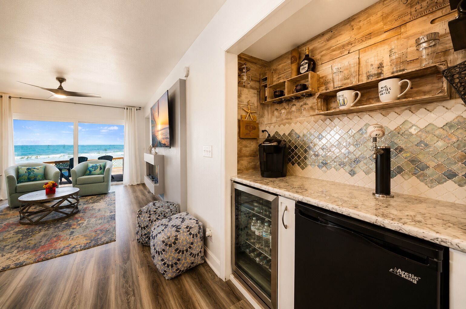 A modern kitchen with a dishwasher, a coffee machine, and a wine rack.