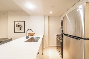 Apartment, 1 Queen Bed with Sofa bed, Balcony, Mountain View (Cascade - 613) | Private kitchen | Coffee/tea maker