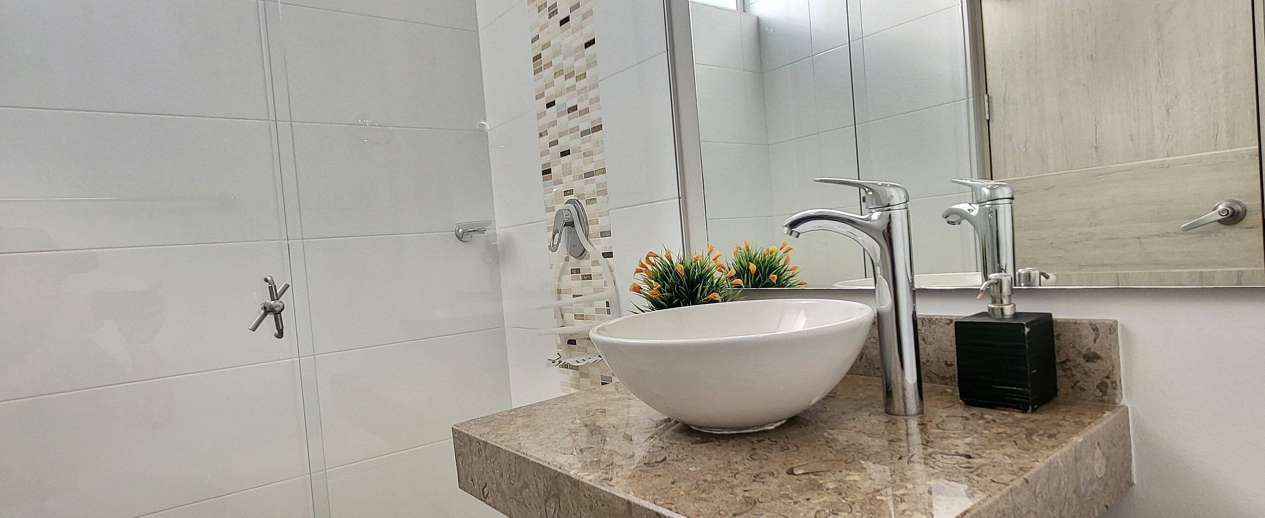 Shower, towels, soap, toilet paper