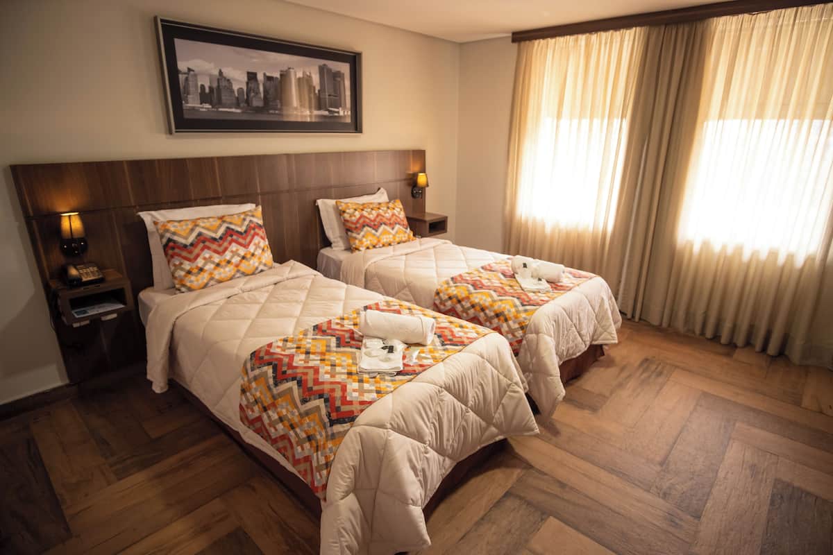 Deluxe Single Room, 2 Twin Beds, City View | 1 bedroom, in-room safe, blackout drapes, free WiFi