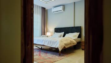 1 slaapkamer, een strijkplank/strijkijzer, wifi, beddengoed