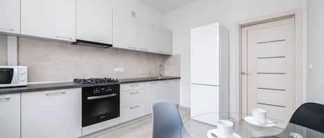 Apartment, Balcony, City View | Private kitchen | Coffee/tea maker, electric kettle