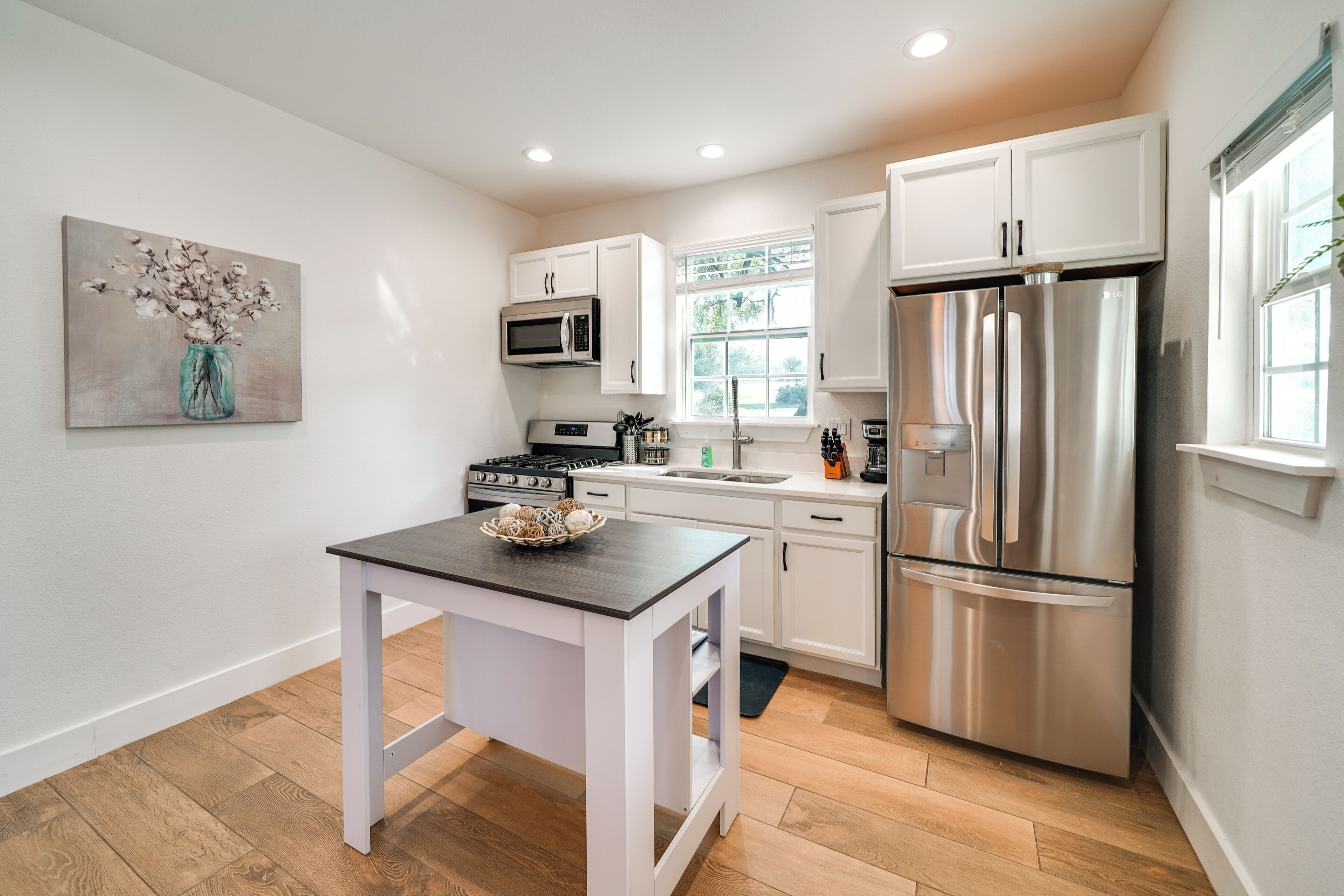 Fridge, microwave, stovetop, coffee/tea maker
