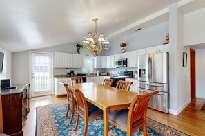 Enjoy cooking in this well-equipped kitchen with a central island and ample counter space.