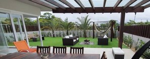 Casa Premium, acceso a la alberca | Restaurante al aire libre