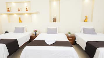 Habitación triple estándar | Wifi gratis y ropa de cama