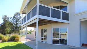 A two-story building with a covered patio area and large windows. - Shell Seeker, Moonta Bay (Moonta Bay)