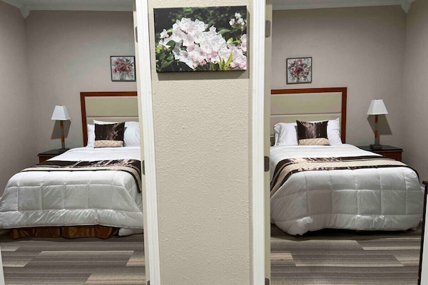 Two private rooms with a double bed in each room