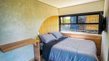 Suite Deluxe, balcón, vista al lago | 1 habitación y wifi gratis