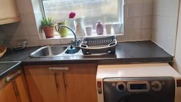 Fridge, dishwasher, cookware/dishes/utensils, dining tables