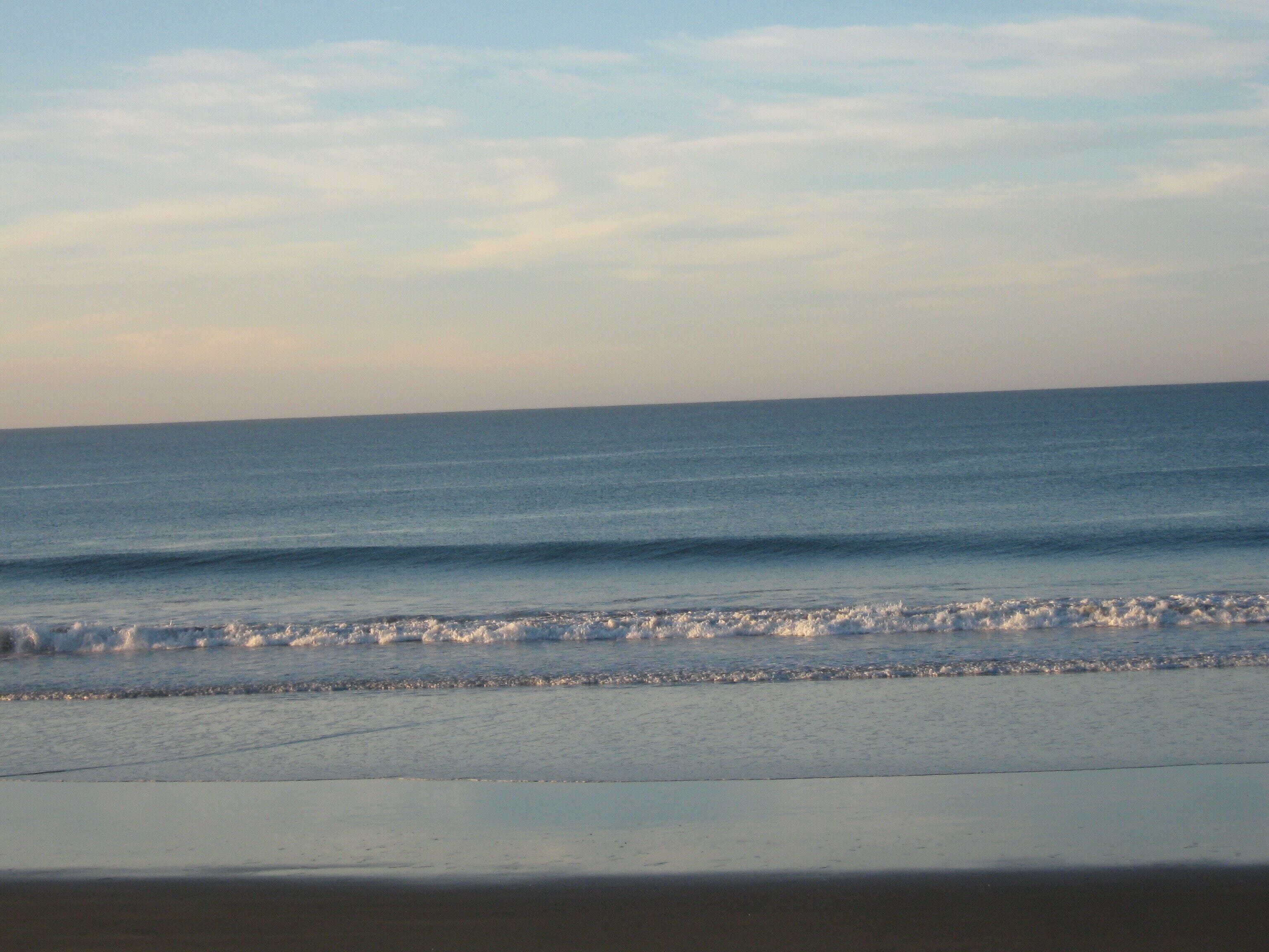 On the beach, sun-loungers, beach towels