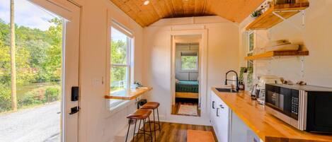 Fridge, microwave, stovetop, coffee/tea maker