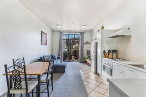 Apartment | Private kitchen | Fridge, microwave, oven, stovetop