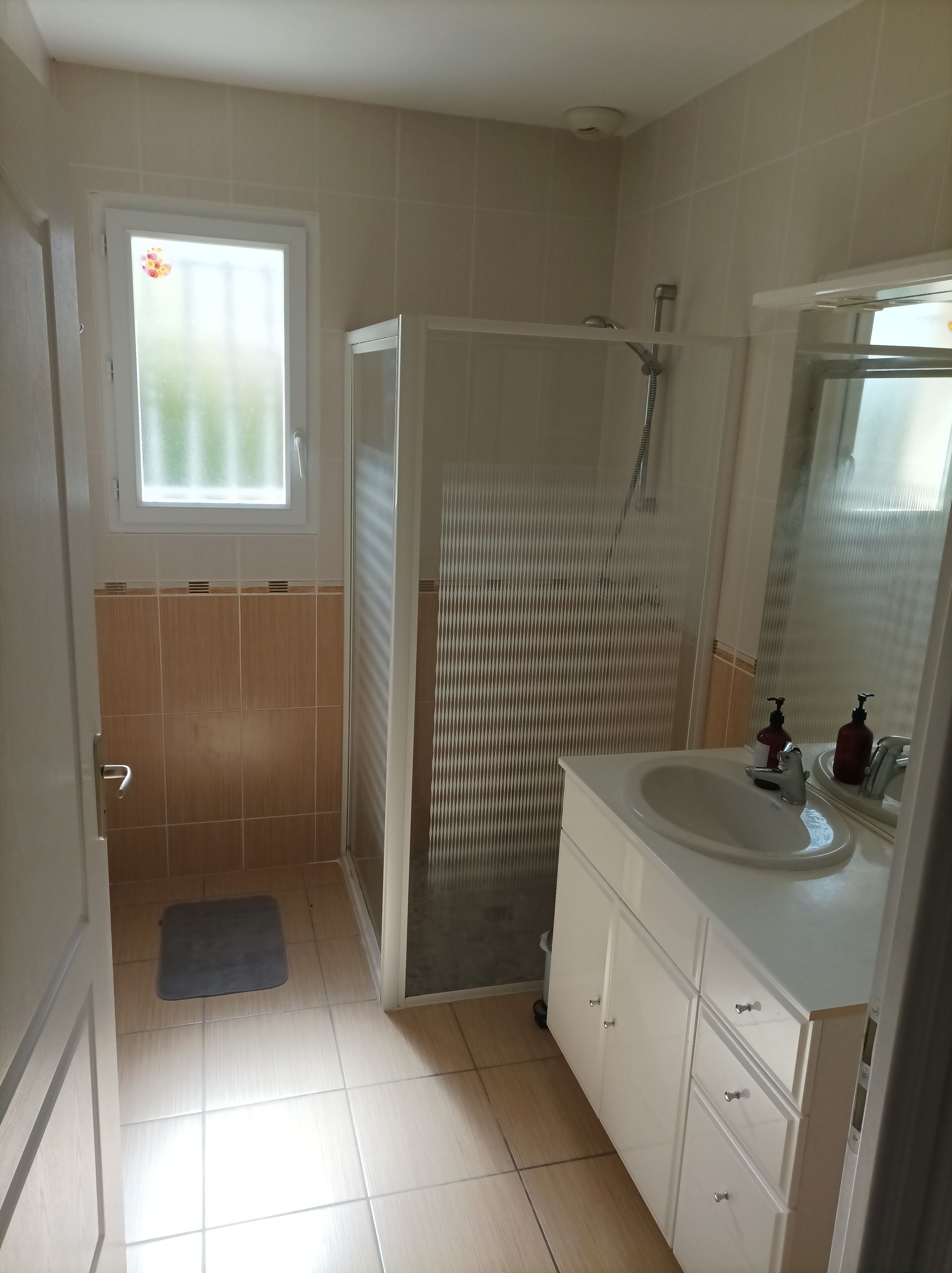 Shower, towels, soap, toilet paper