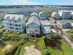 A coastal residential area with multi-story buildings, a marina, and a lake. - Carolina Breeze by Carolina Getaway - Spacious 3BR Condo w/ Ocean & Sound Views (Carolina Beach)